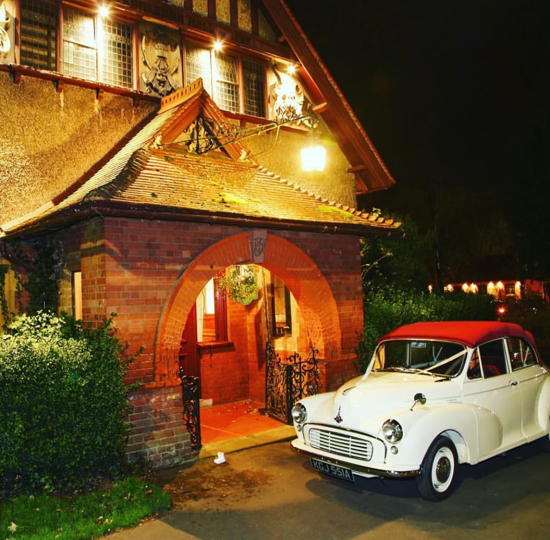 Wedding car outside Waddesdon Hall in the evening