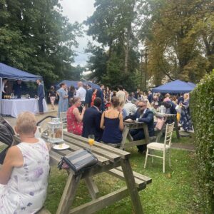 Party guests in the Waddesdon Hall garden